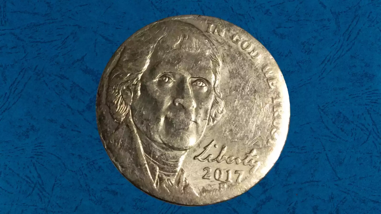 2017 nickel broadstrike error showing wider than normal diameter with flattened rim